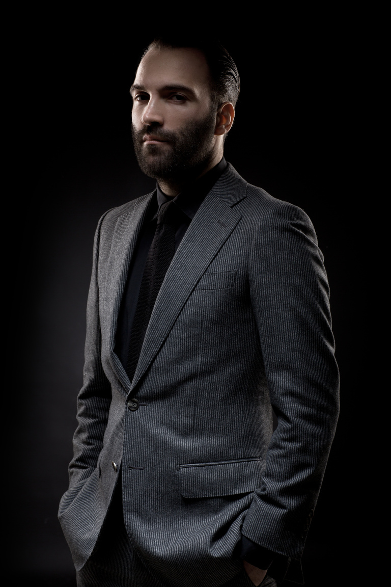 Portrait profile picture of a stylish bearded gentleman